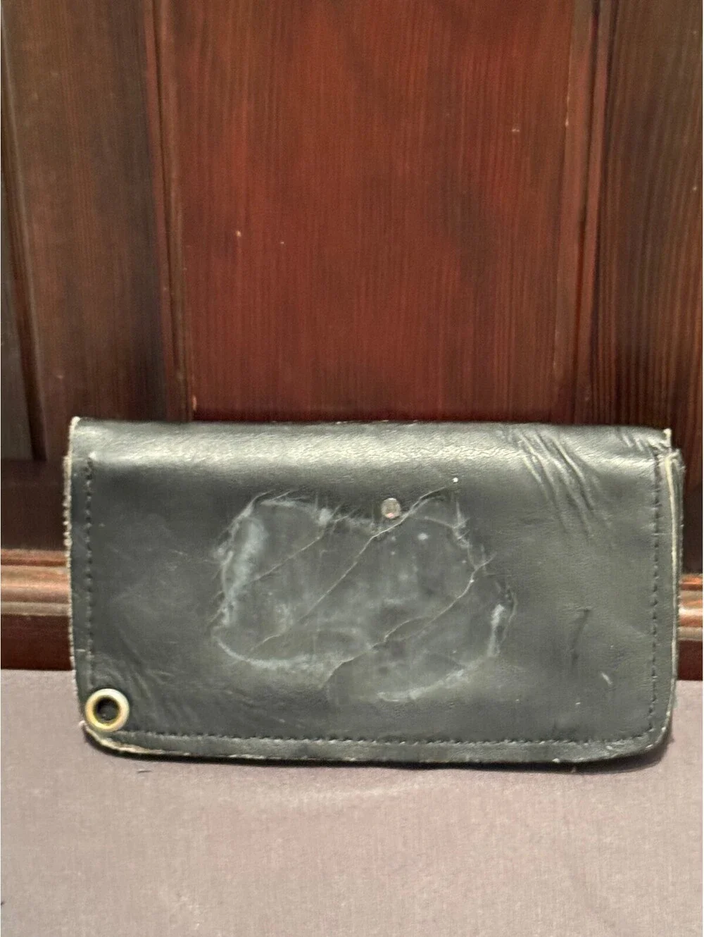 Black Leather Wallet with Snap Buttons and Zippered Compartment